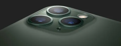 Apple iPhone 11 Pro triple-camera detail in Midnight Green