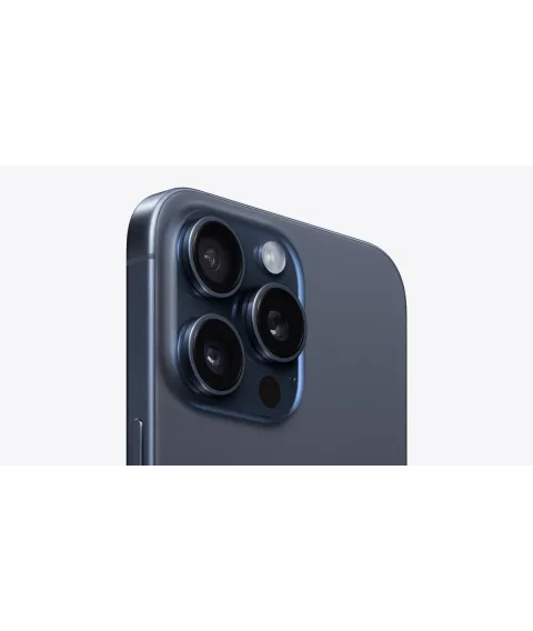 Angled close-up of the Pro camera system on the Apple iPhone 15 Pro Max in Blue Titanium