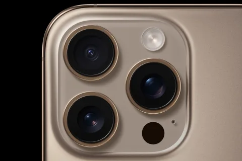 Apple iPhone 16 Pro in Desert Titanium, rear camera close-up