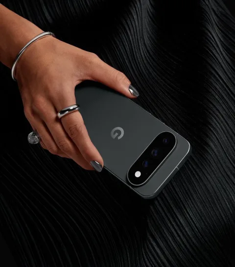 A person holding Google Pixel 11 Pro XL in matte Obsidian.