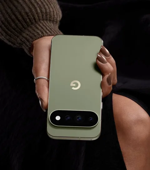 A person holding Google Pixel 11 Pro in Olive.