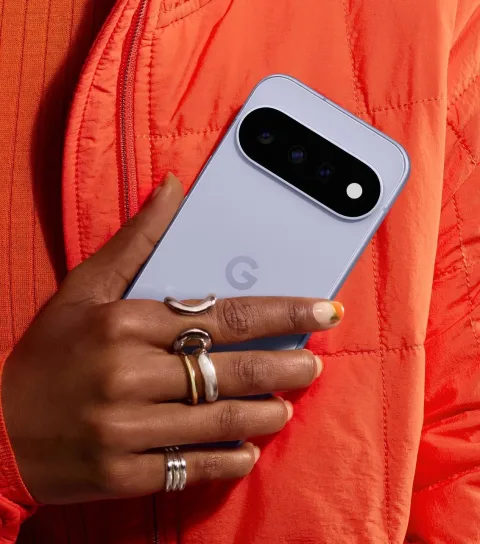 A person holding Google Pixel 11 in Frost.