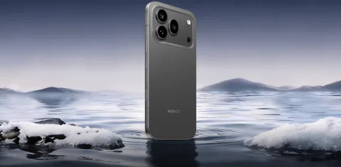Honor 600 Pro in Black on a night beach