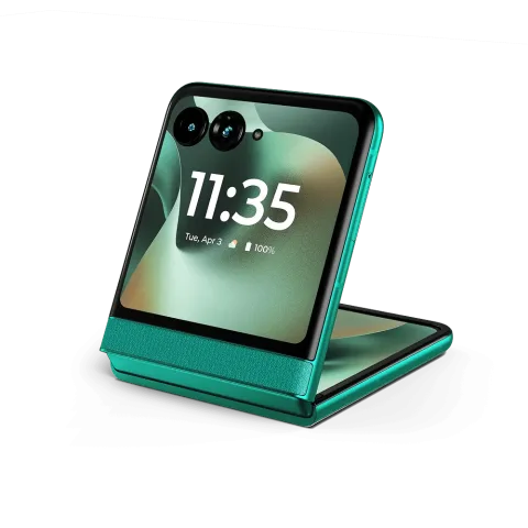 Motorola Razr 70 in PANTONE Sporting Green, half-open in flex mode propped up