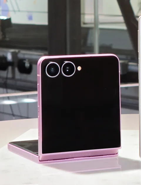 Samsung Galaxy Z Flip8 in Pink, closed, dual rear camera and hinge visible, on display at Galaxy Unpacked July 2026