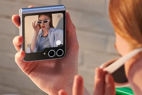Samsung Galaxy Z Flip6 in Blue, FlexCam mode in use, half-folded on a table