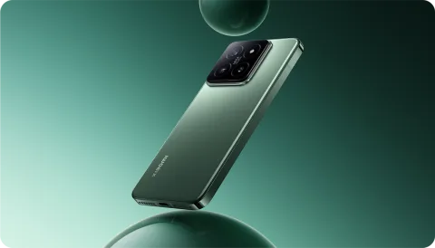Xiaomi 14 in Jade Green, back three-quarter view