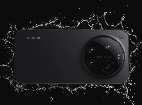 Xiaomi 17 Ultra in Black splashing through water over rocks