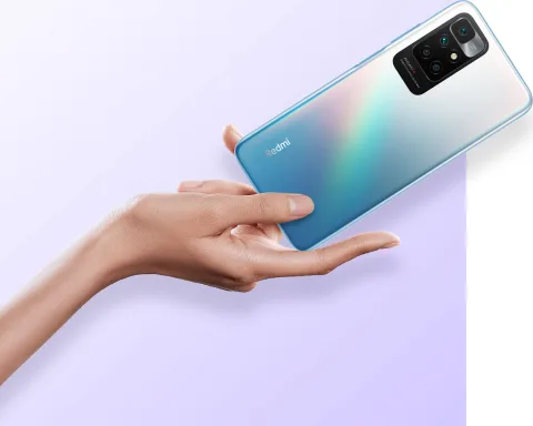 Redmi 10 2022 in Sea Blue, held in hand showing back