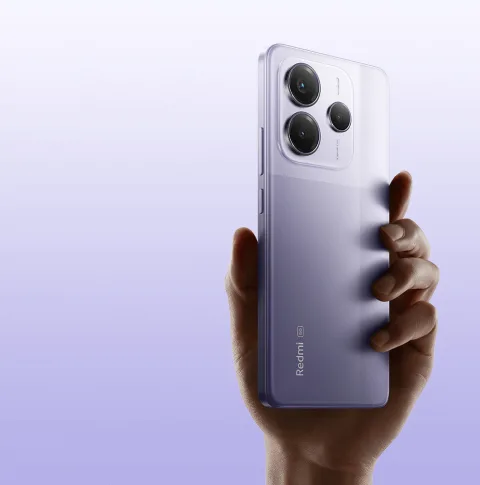 Redmi Note 14 5G in Lavender Purple, held in hand, back view